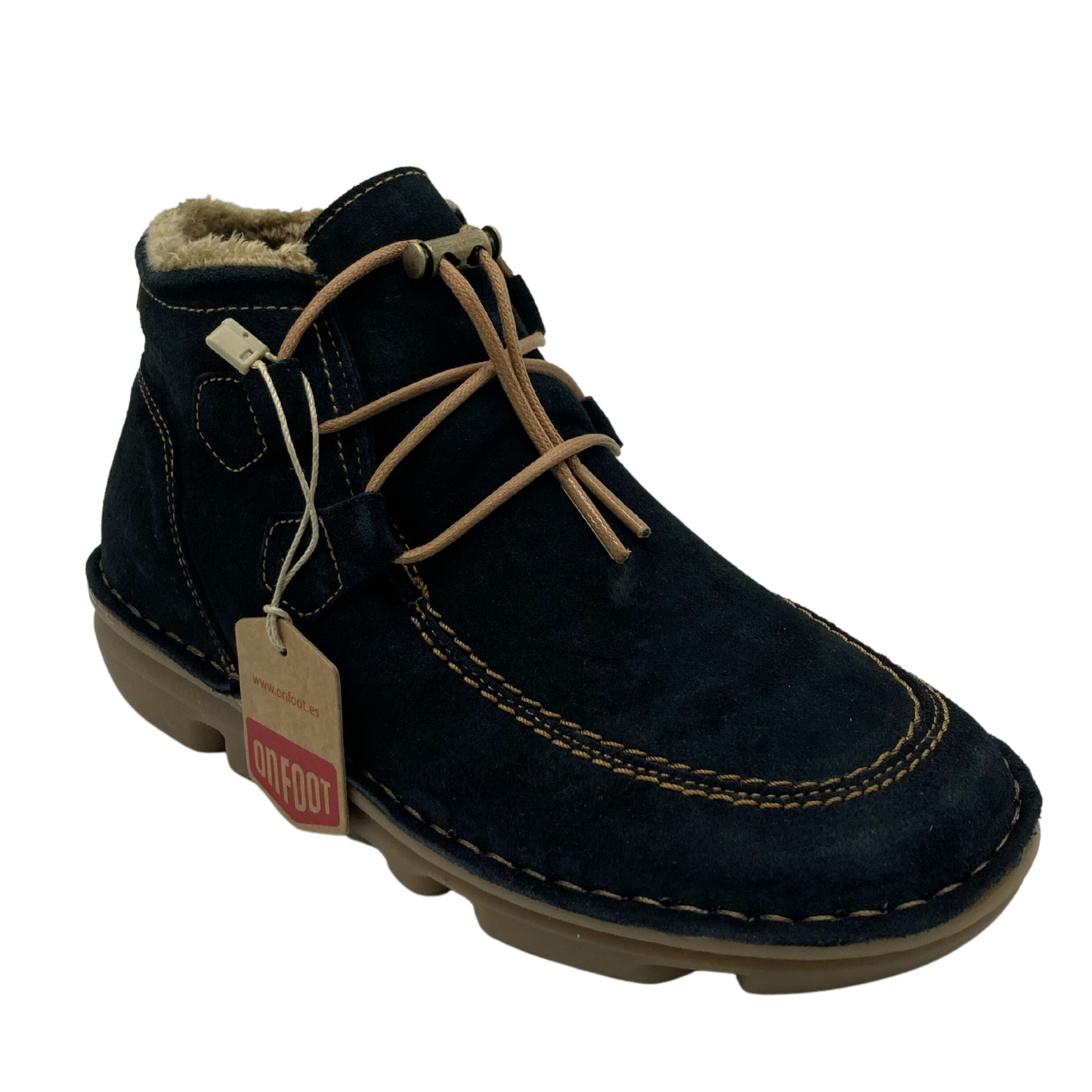 45 degree angled view of blue suede short boot with tan stitching and cord laces