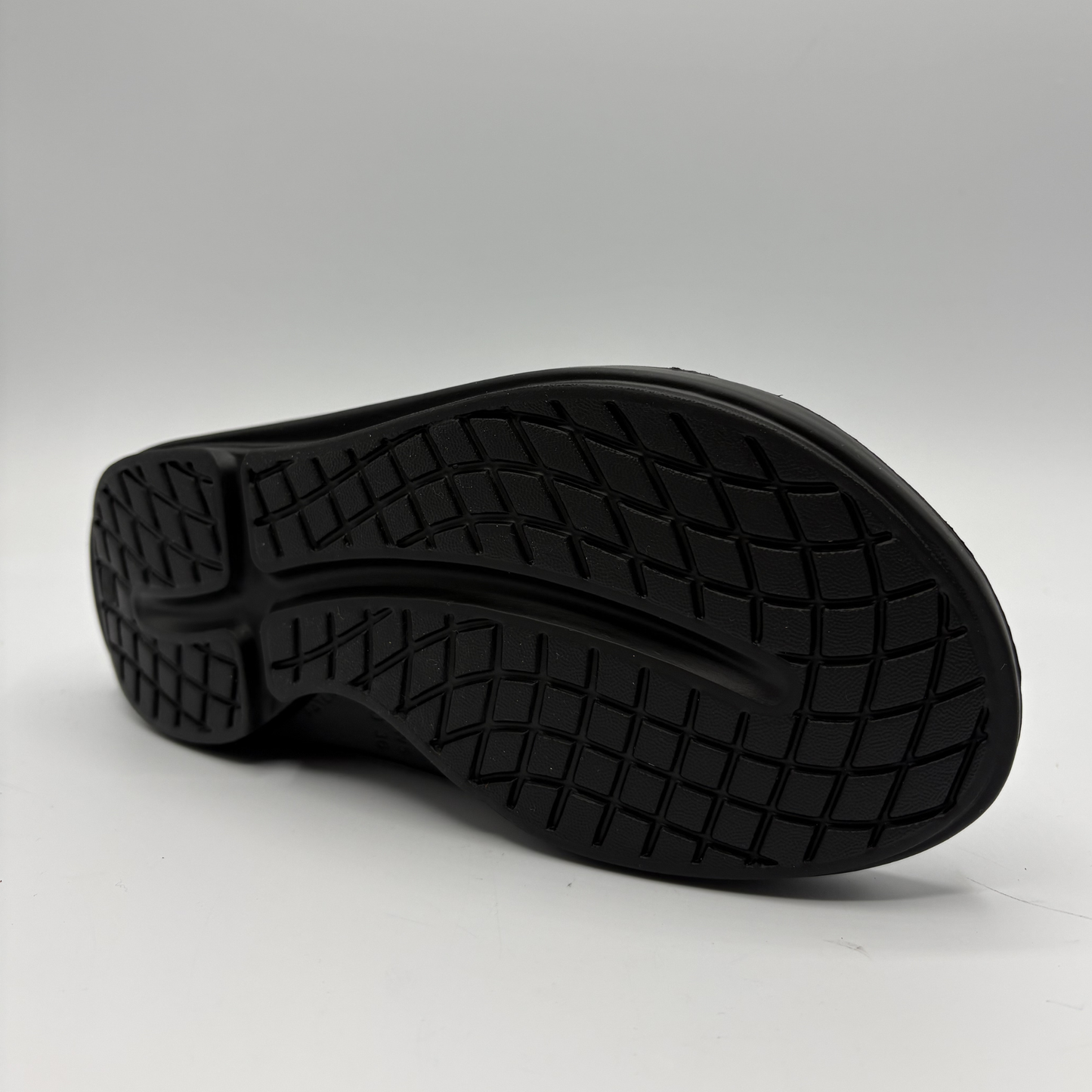 Black shoe sole on a white background