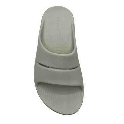 Top view of a grey foam slide with two over-foot straps and a grippy sole.