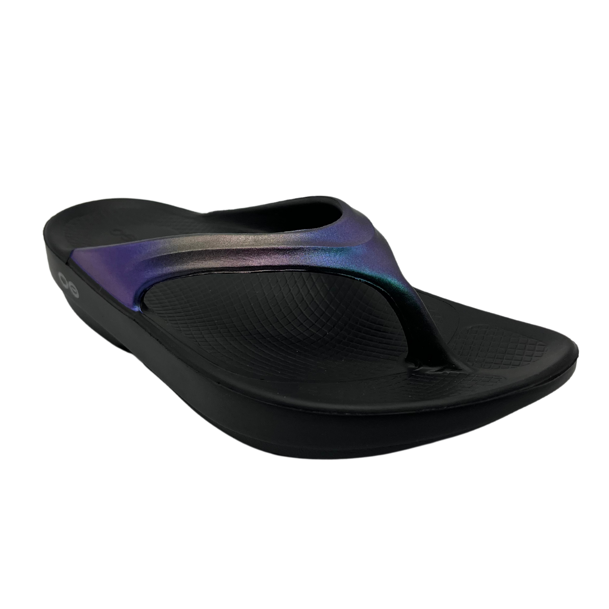 45 degree angled view of black thong sandal with iridescent purple upper