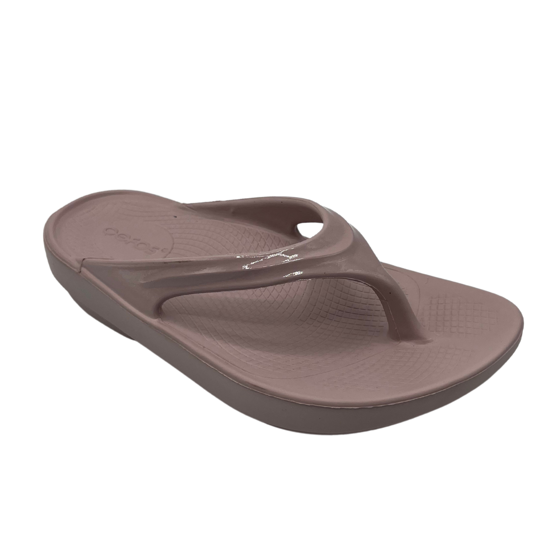 45 degree angled view of pink foam thong sandal