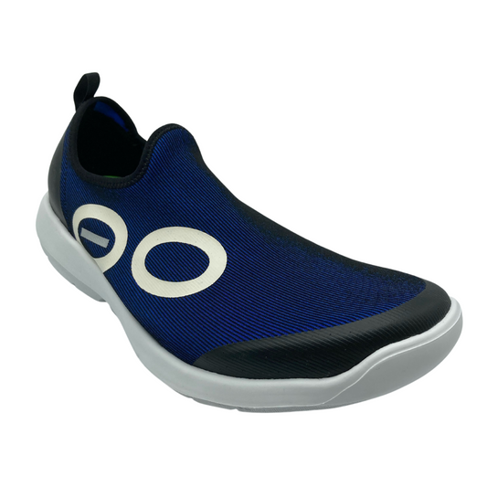 45 degree angled view of sneaker with navy and black upper on a white sole