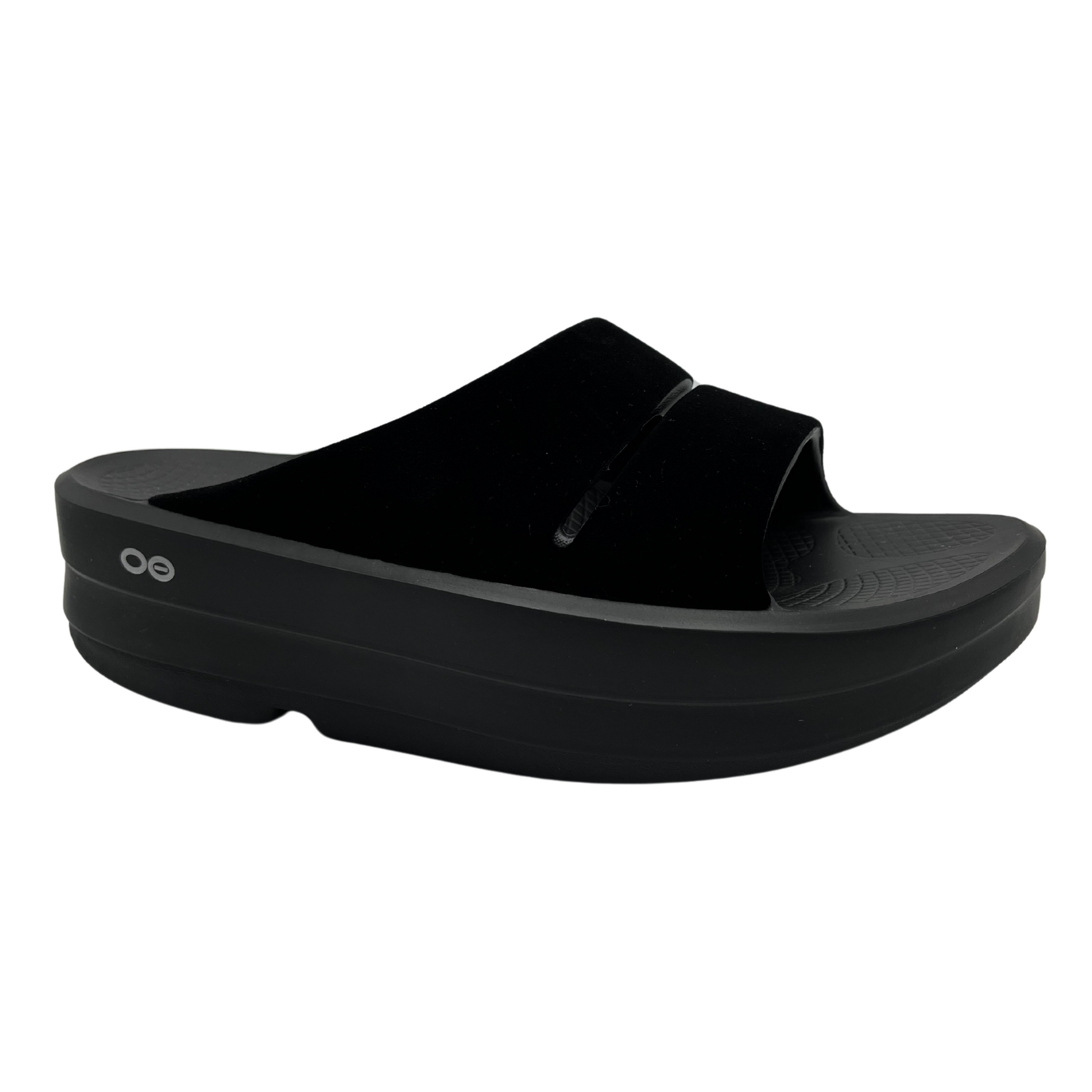 45 degree angled view of black platform sole slip on sandal with matte black double strap