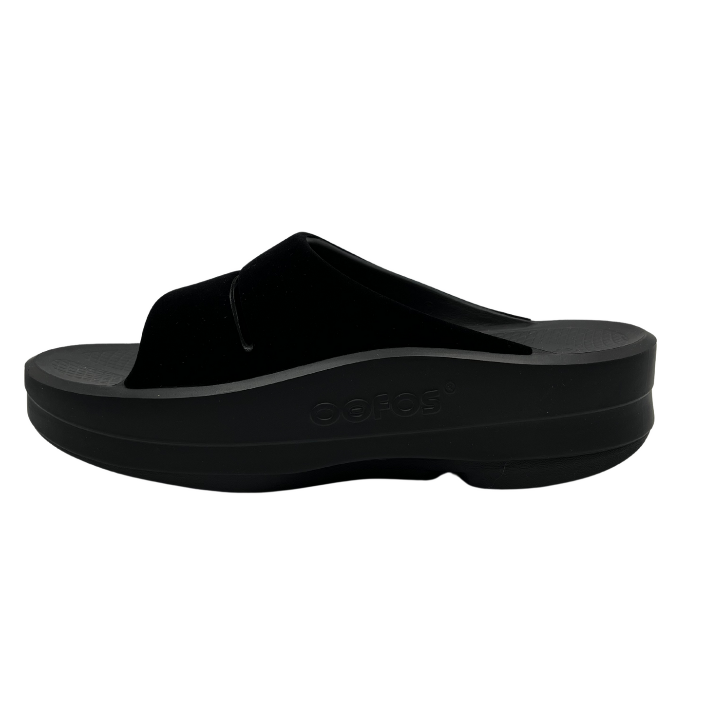 Left view of black platform sole slip on sandal with matte black double strap