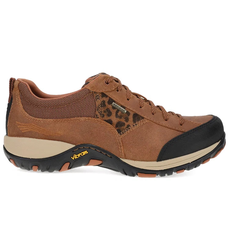 A brown low-top sneaker with a leopard-print pattern panel, black toe cap and outsole, and a beige midsole, shown from the side on a white background.