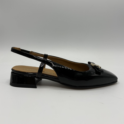Right facing view of a black patent leather slingback shoe with a wrapped heel