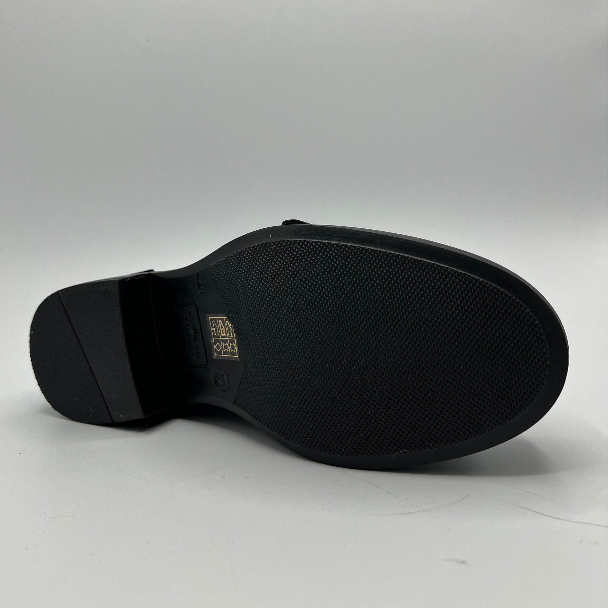 Black shoe sole on a white background