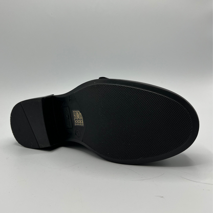 Black shoe sole on a white background