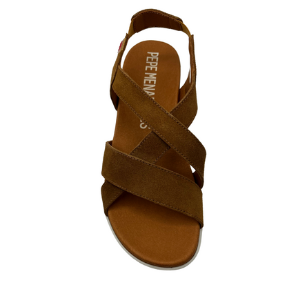 Top view of brown suede sandal with elastic slingback strap and white rubber outsole