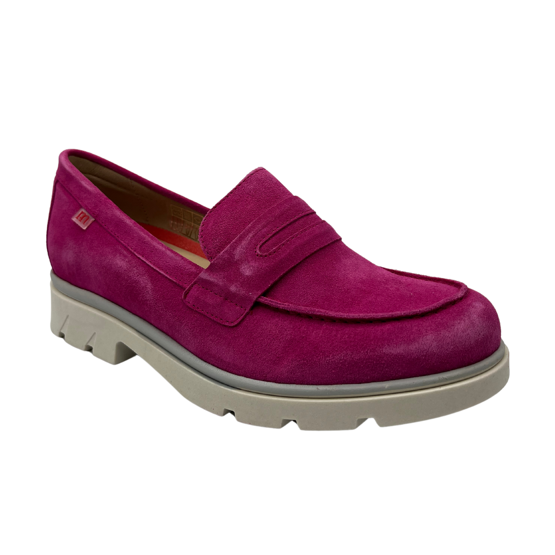 45 degree angled view of fuchsia suede loafer with chunky white sole