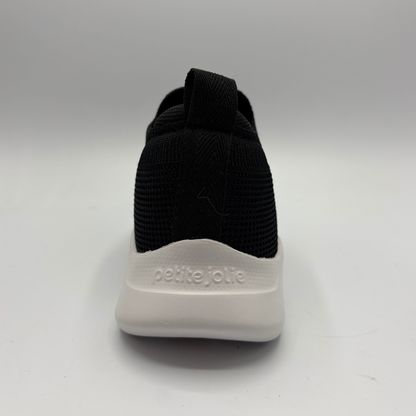 Black sock with white sole on a gray background