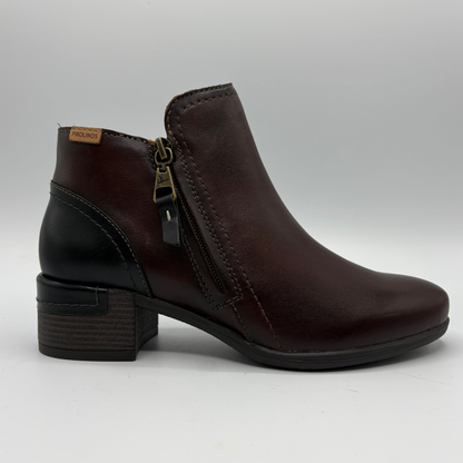 Right facing view of a brown leather ankle boot with a stacked heel and side zipper closure