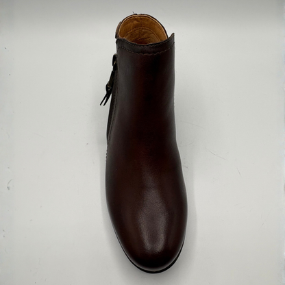 Top view of a brown leather ankle boot with a stacked heel and side zipper closure