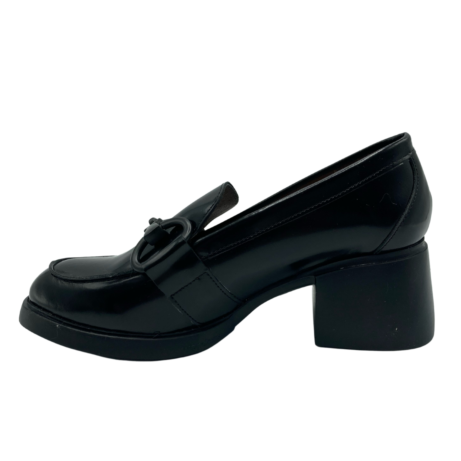 Left facing view of heeled leather loafer 