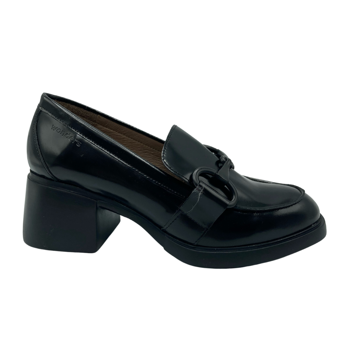 Side view of black glossy leather loafer with black rubber heel