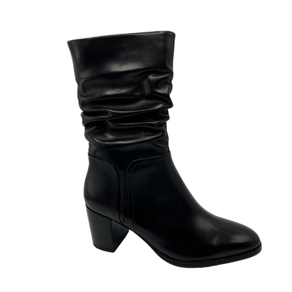 45 degree angled view of black leather slouchy boot with block heel, rounded toe