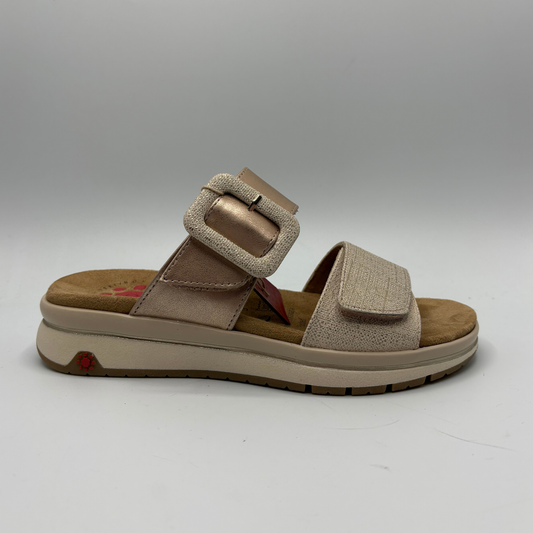 Beige sandal with a buckle on a white background