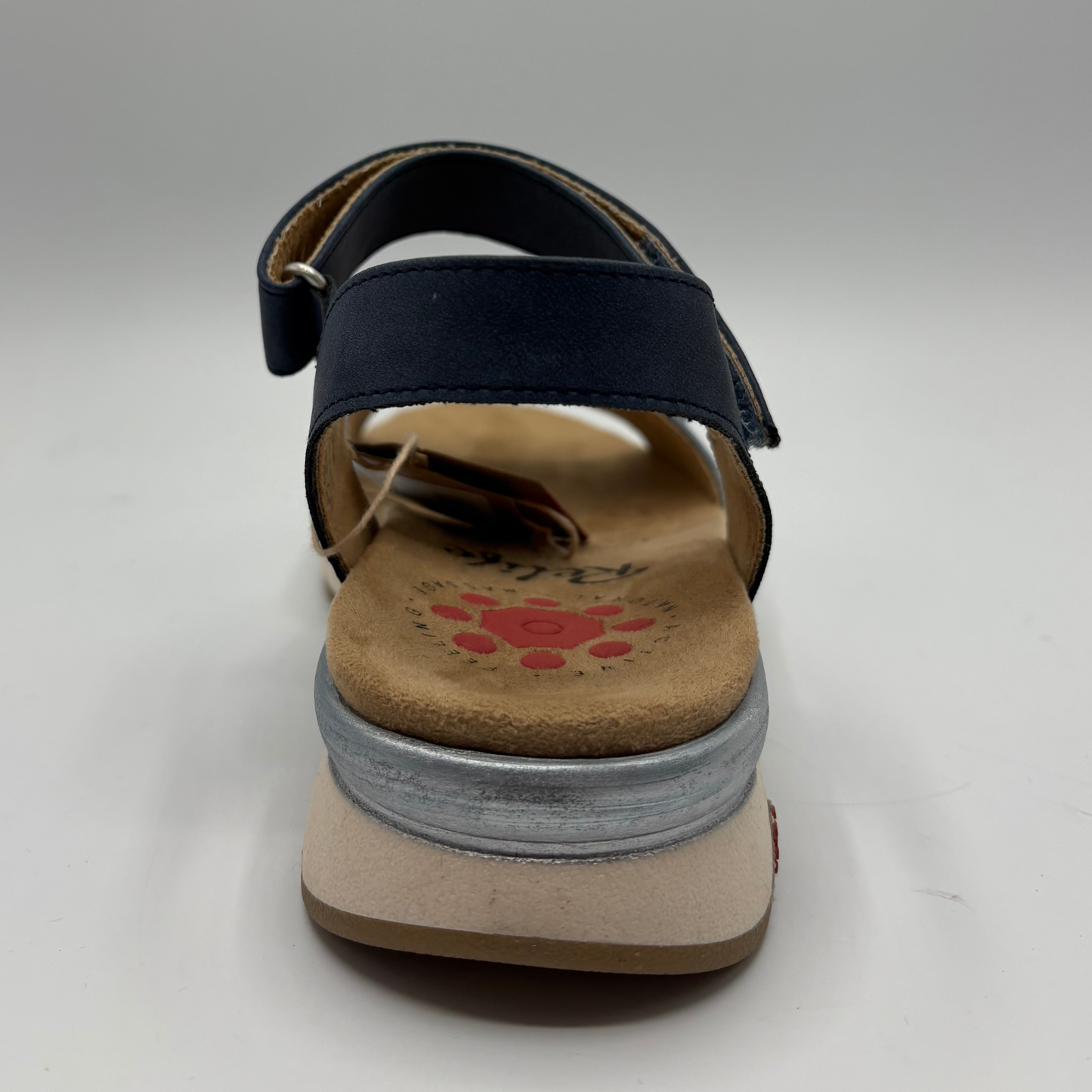 Black sandal with a visible brand logo on a white background