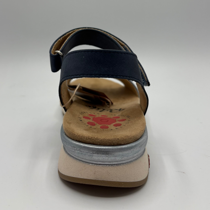 Black sandal with a visible brand logo on a white background
