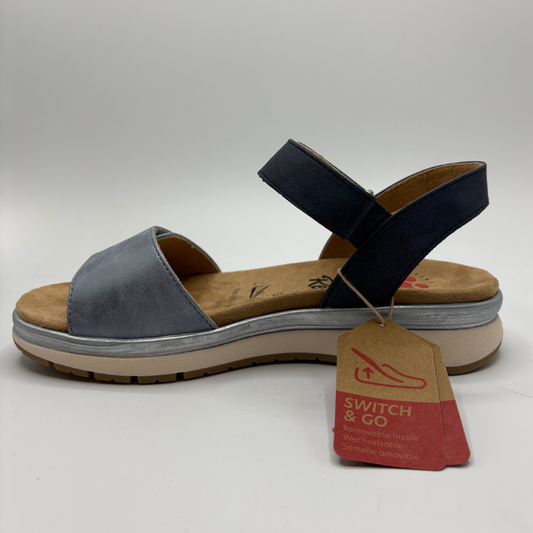 Blue sandal with a brown sole on a white background