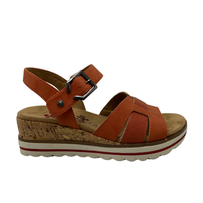 Right facing view of vegan wedge sandal with rusty orange textile upper. Silver metal buckle on ankle strap