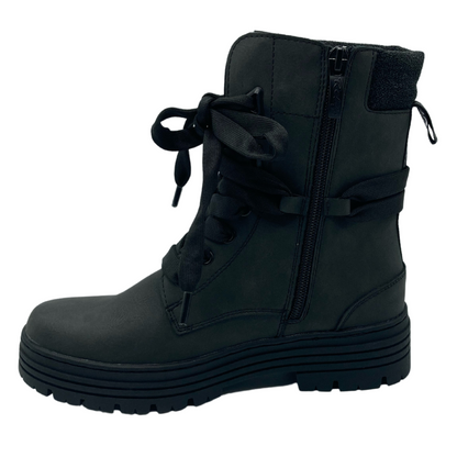 Left facing view of short black boot with side zipper closure, black rubber outsole and laces
