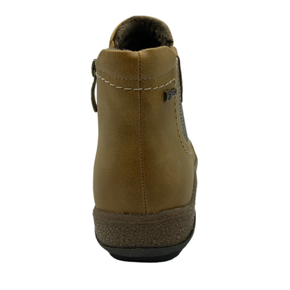 Back view of short ankle boot with brown and black rubber outsole
