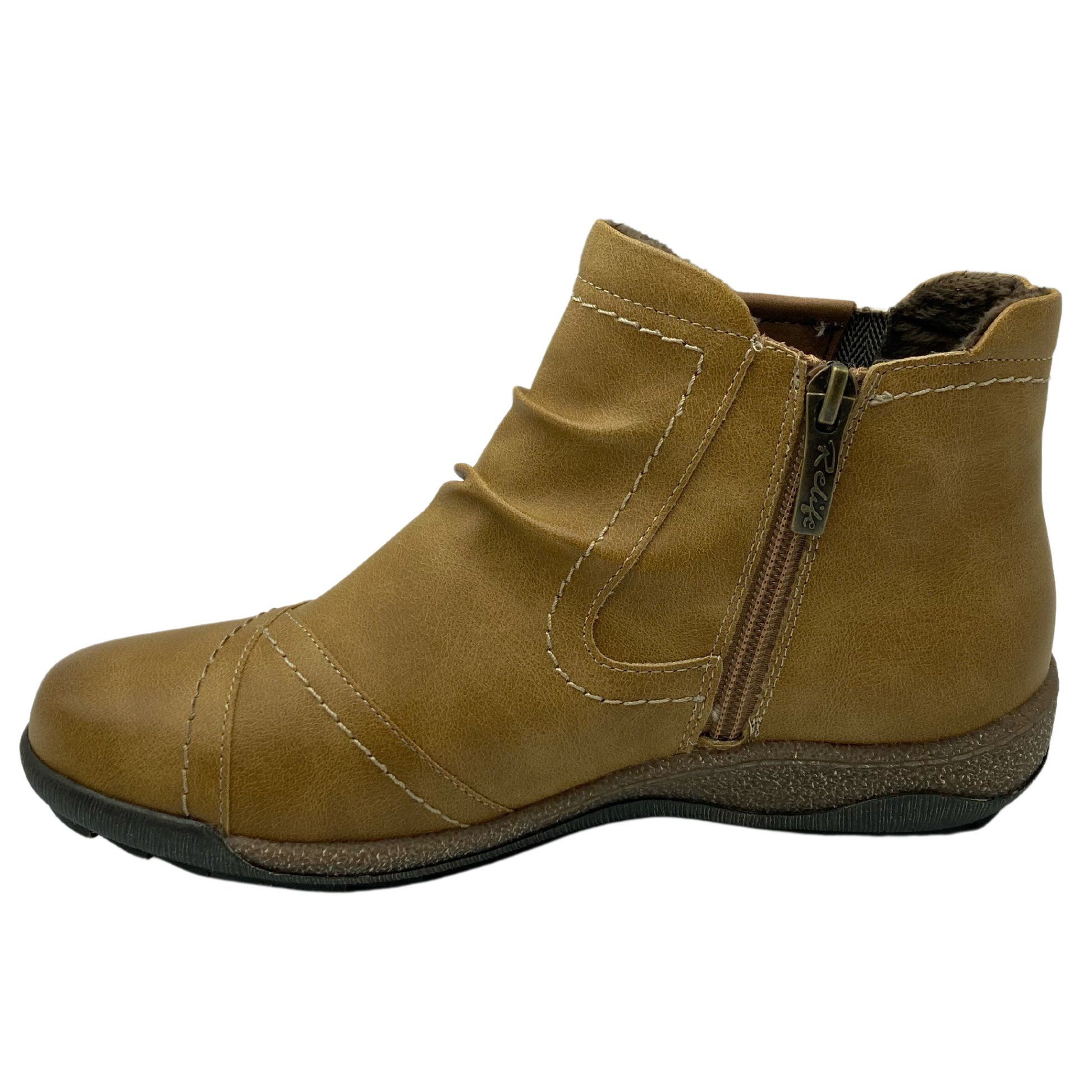 Left facing view of mustard short boot with inner side zipper and rubber outsole