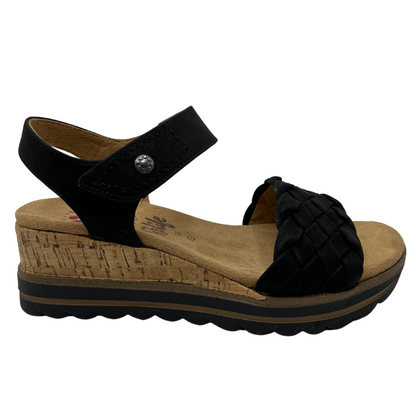 Right facing view of black strapped wedge sandal with velcro strap