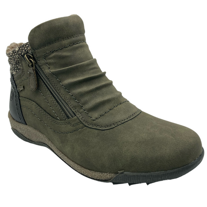 45 degree angled view of khaki green faux suede bootie with zipper closure and rubber outsole