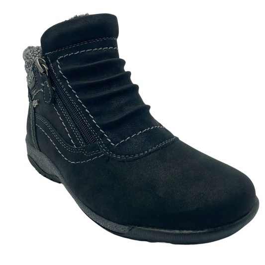 45 degree angled view of black suede ankle boot with side zipper and rubber outsole