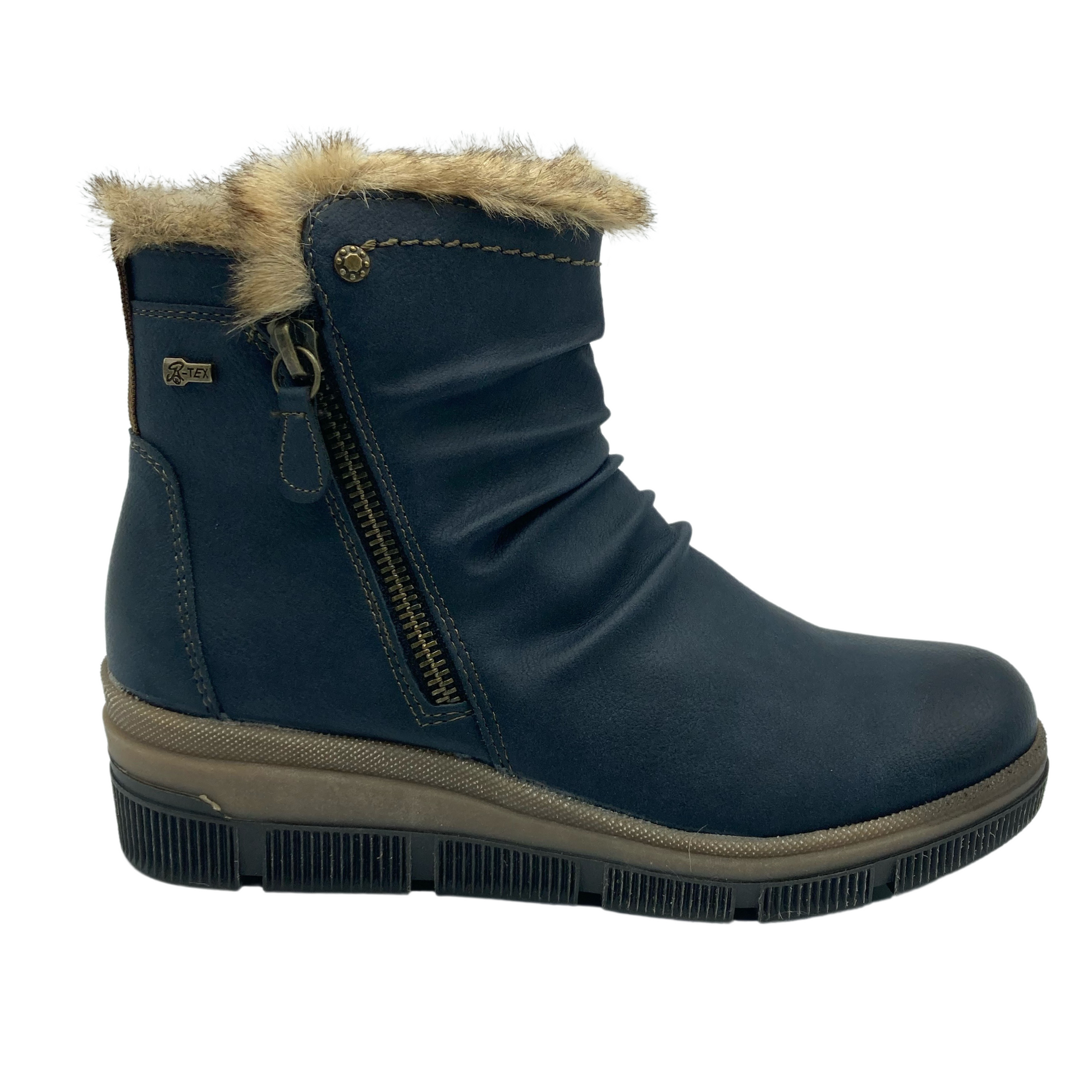 Right facing view of blue vegan leather bootie with faux fur lining, side zipper closure and wedge sole