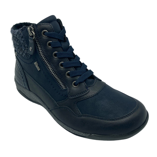 45 degree angled view of insulated navy ankle boot with rubber outsole and blue laces