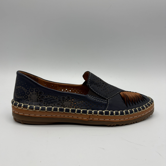 Navy loafer shoe with brown accents on a white background