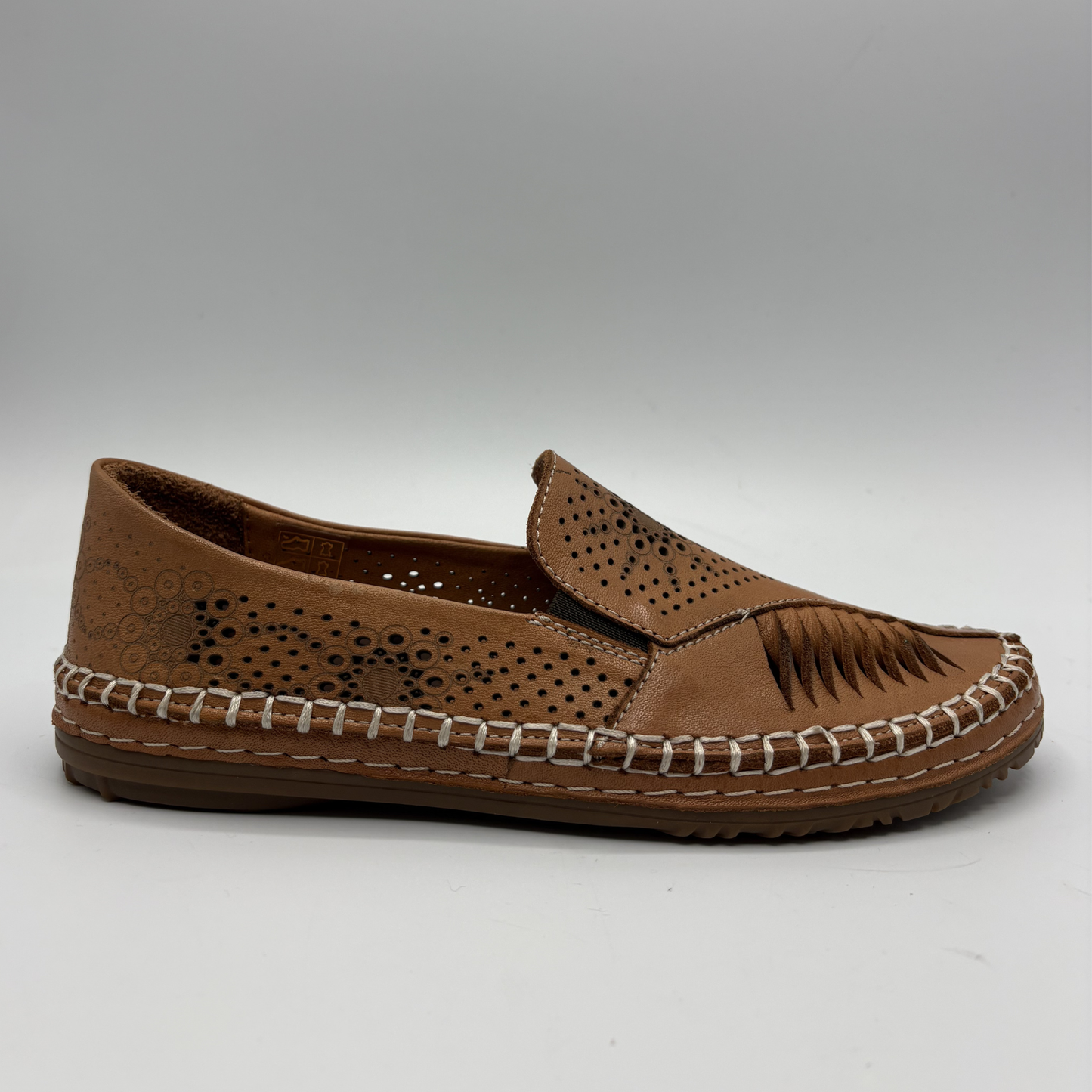 Brown loafer shoe on a white background