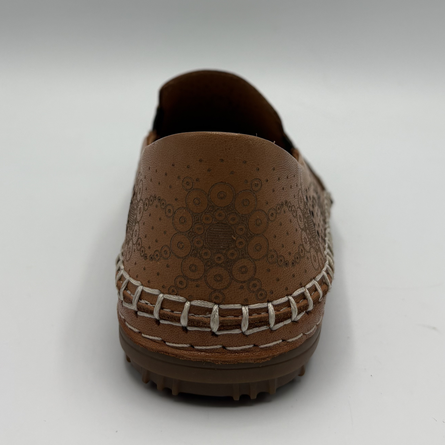 Brown loafer shoe on a white background
