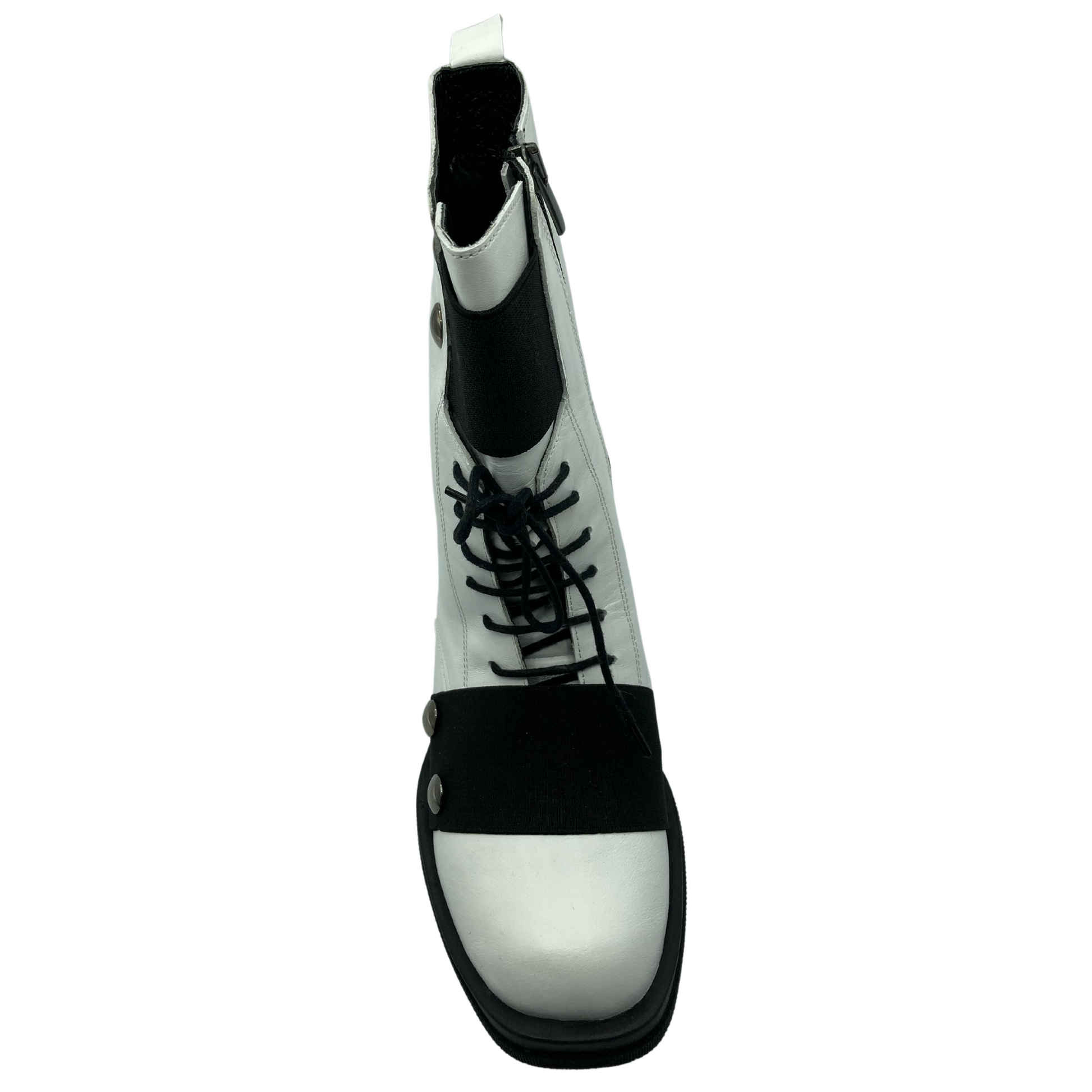 Top view of white leather short boot with side zipper closure and black laces