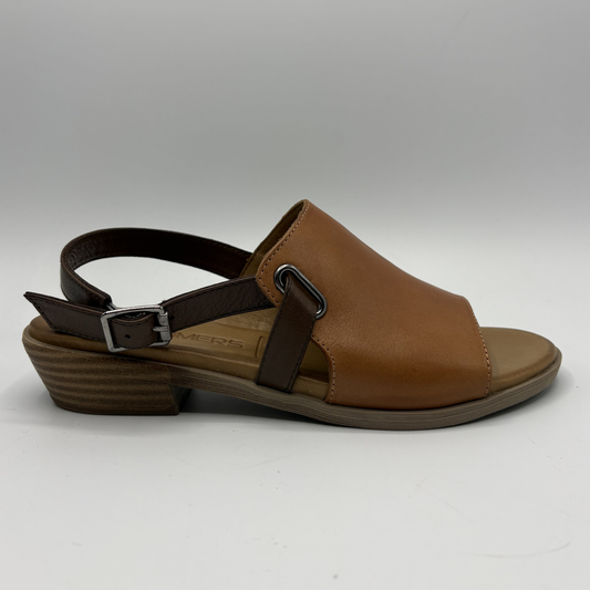Brown sandal with a strap on a white background