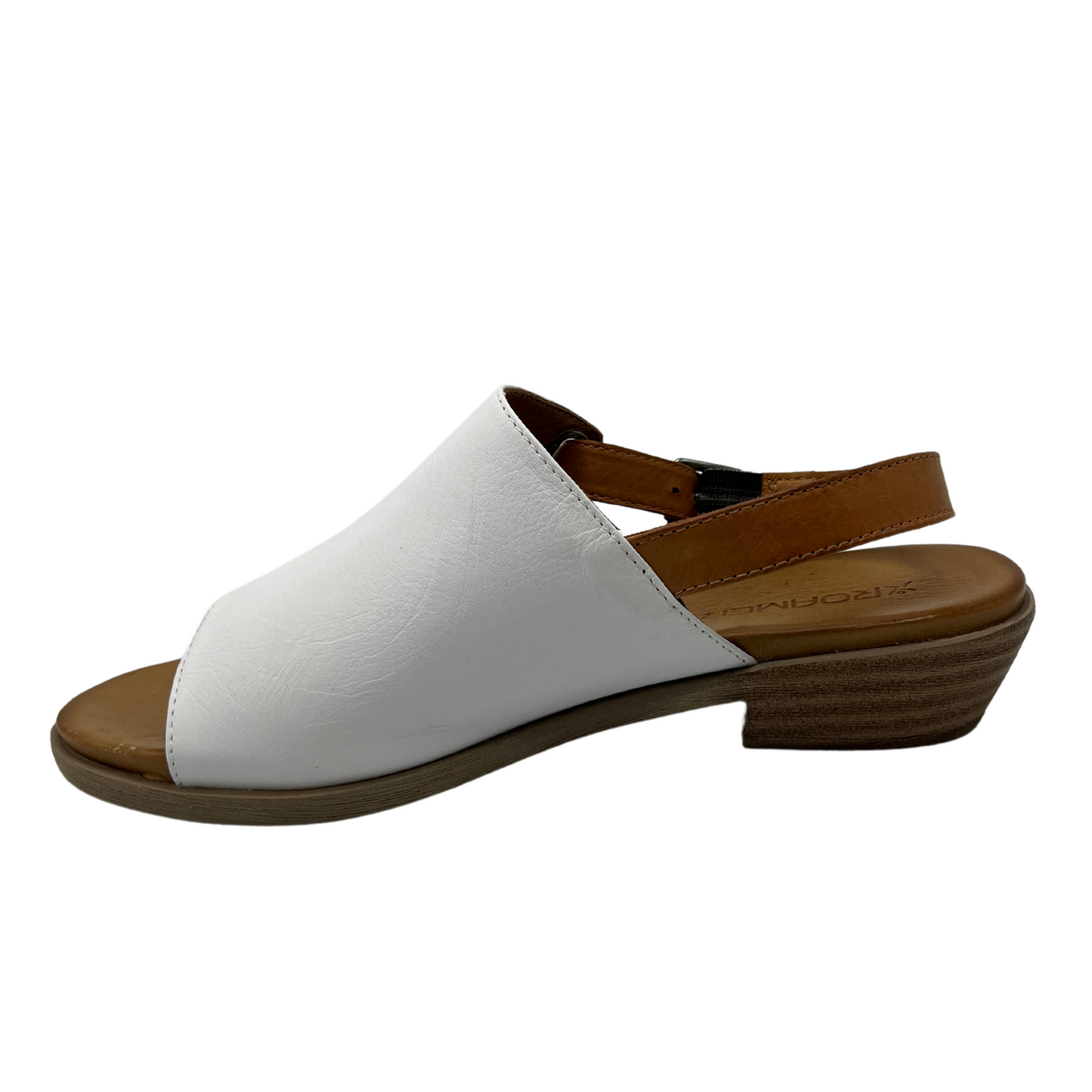 Left facing view of white leather sandal with brown strap and low heel