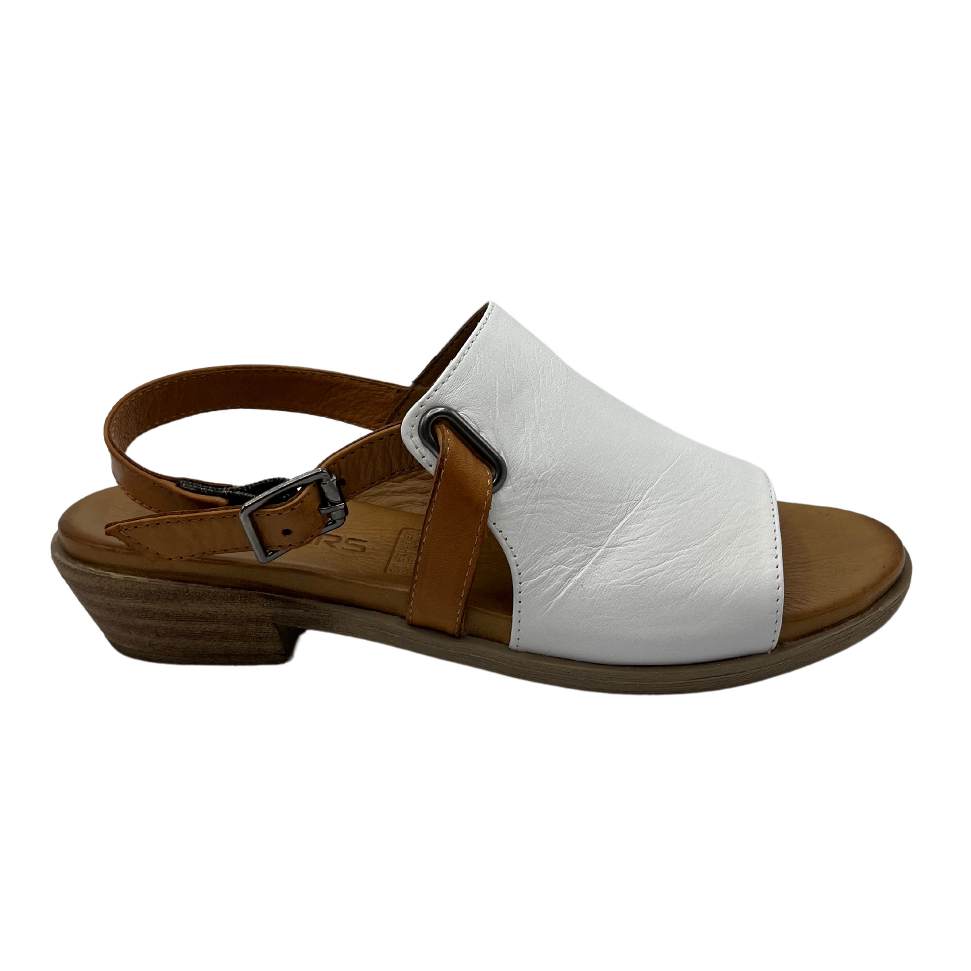 Right facing view of white leather sandal with brown strap and low heel