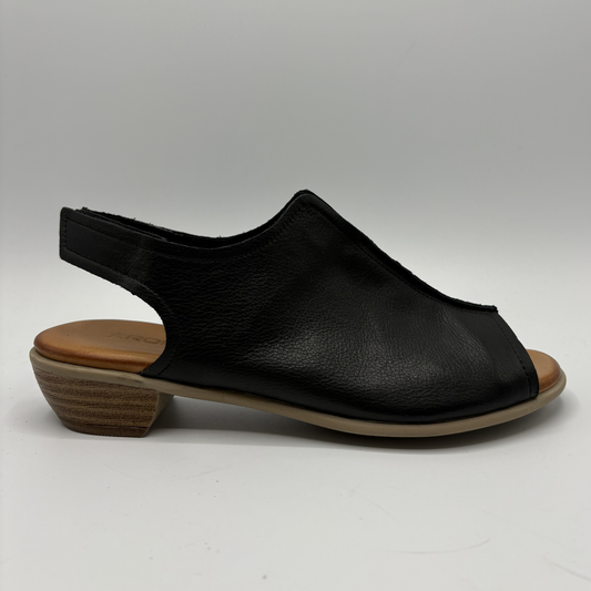 Black sandal with a wooden sole on a white background