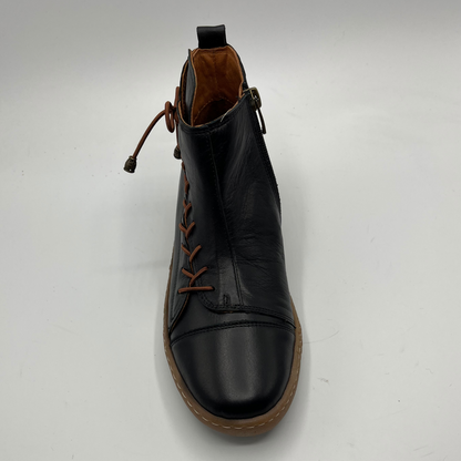 Black leather boot with brown laces on a white background