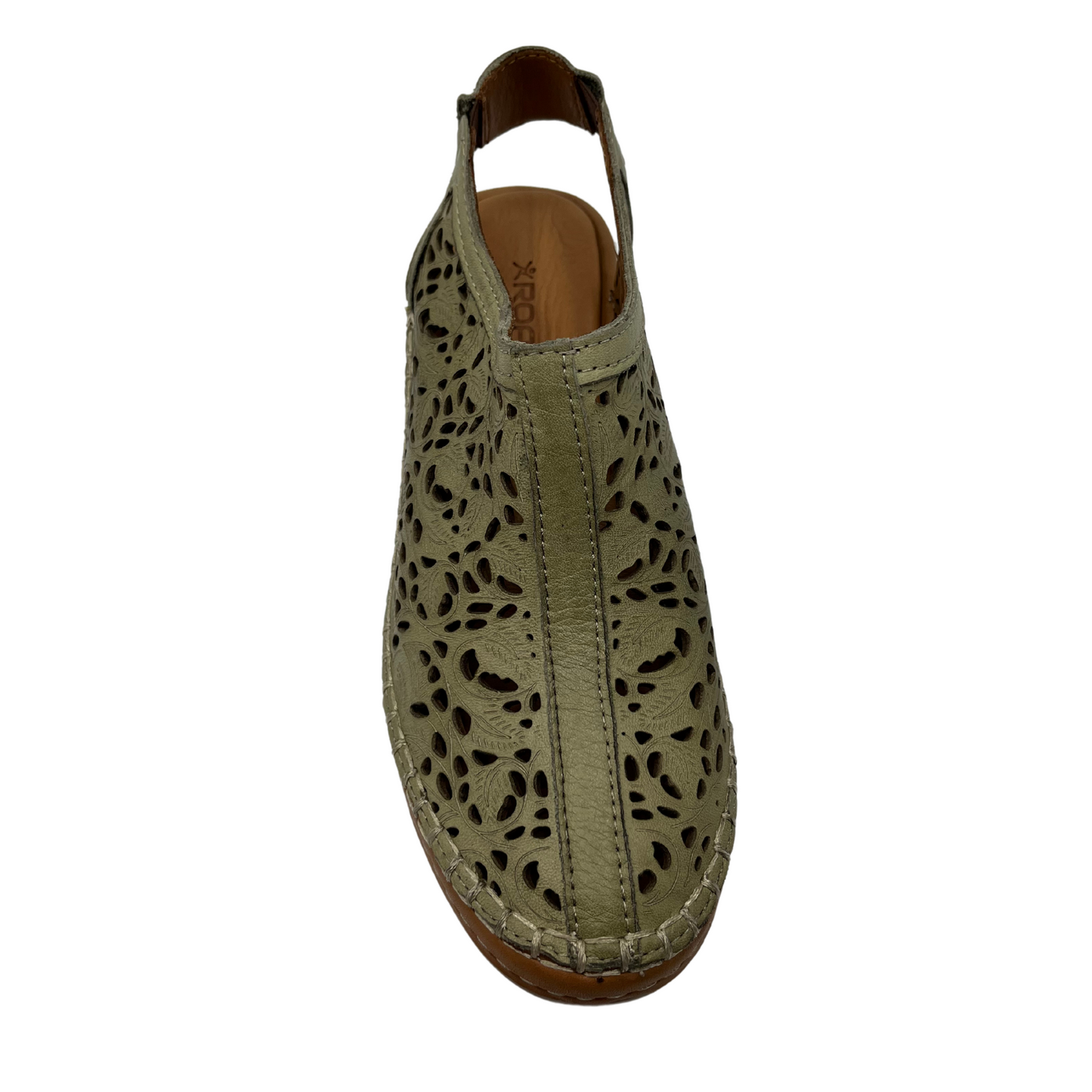 Top view of light green leather shoe with cut out design with low wedge heel