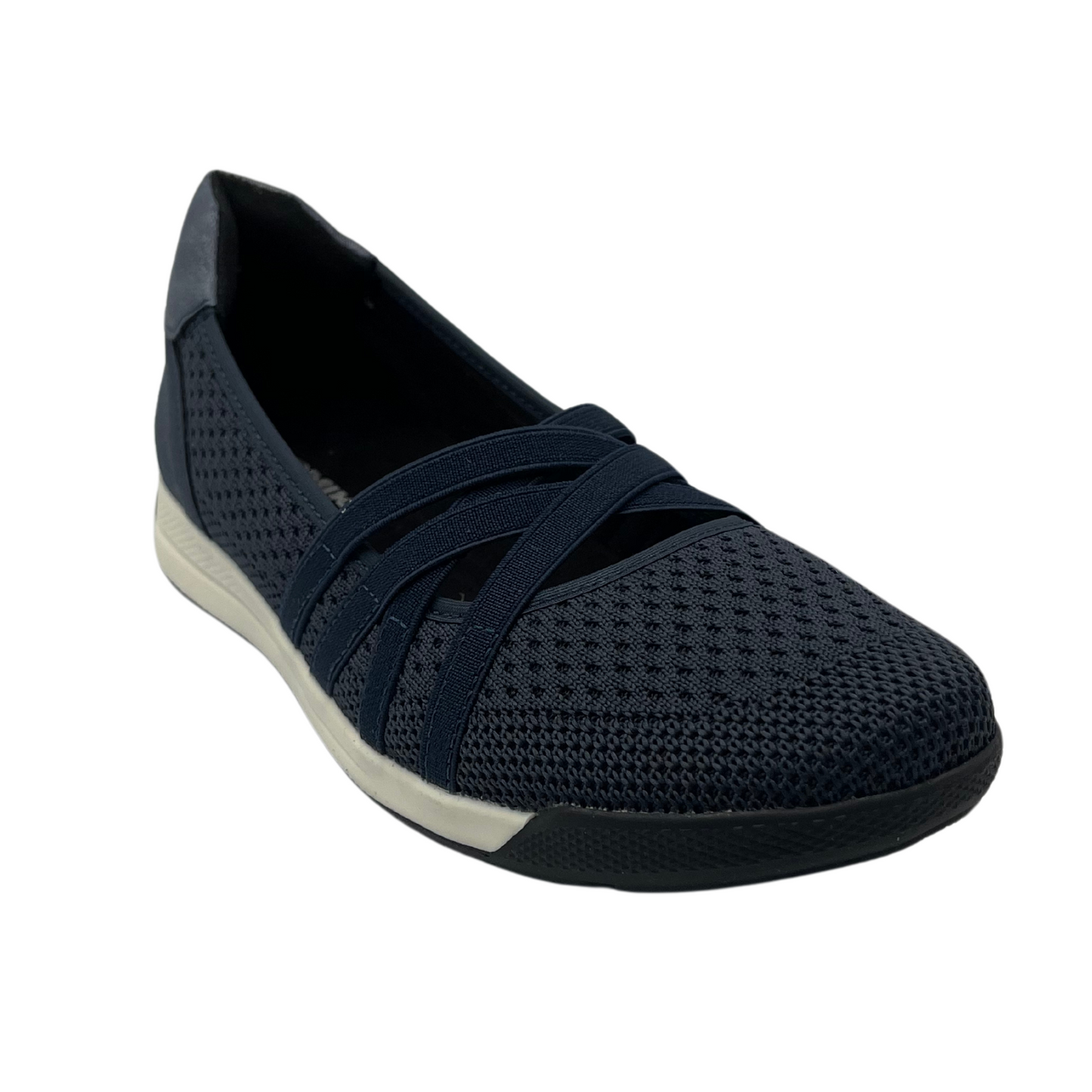 45 degree angled view of navy mesh  flat shoe with criss-cross straps and white and black rubber outsole