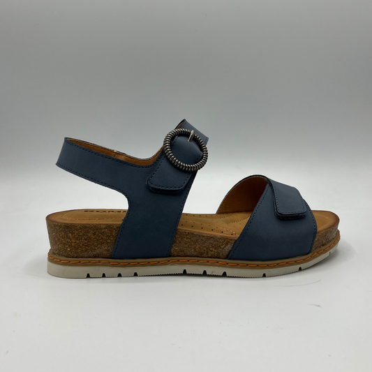 Right facing view of  a blue leather sandal with adjustable straps and a contoured cork footbed.