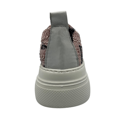 Back view of pink and black mesh sneaker with ultralight white platform sole with white laces.