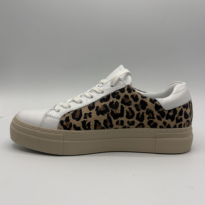 Left view of a leopard print sneaker with a beige rubber outsole