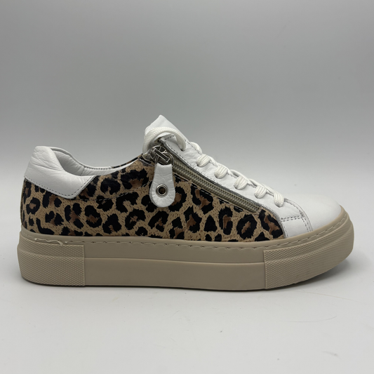 Right facing view of a leopard print sneaker with a beige rubber outsole