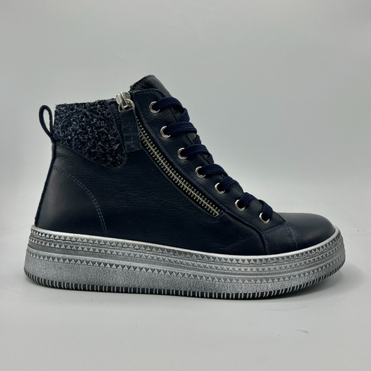 Deep Navy high-top sneaker with a silver zipper on a light gray background