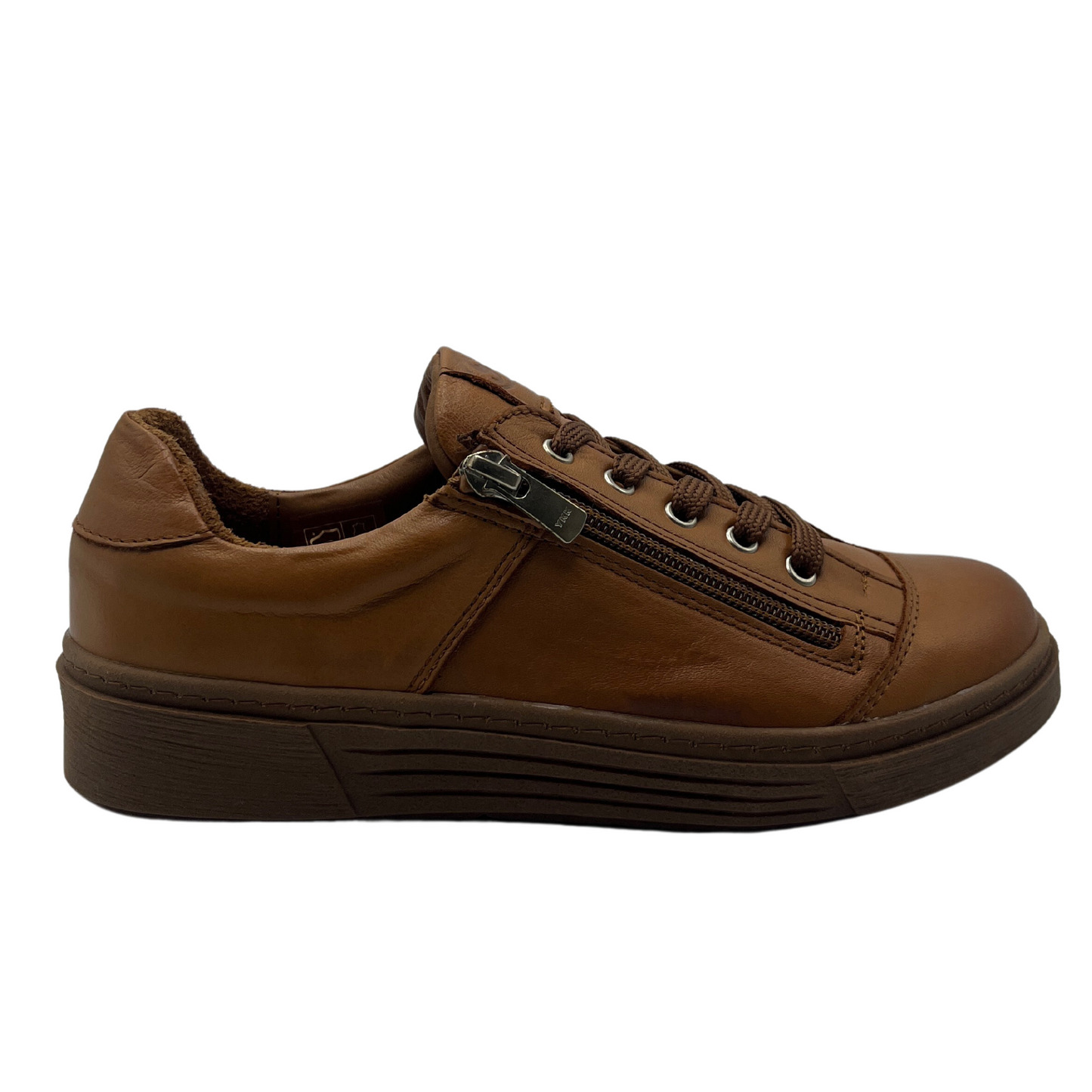 Right facing view of brown leather sneaker with leather lining and side zipper closure
